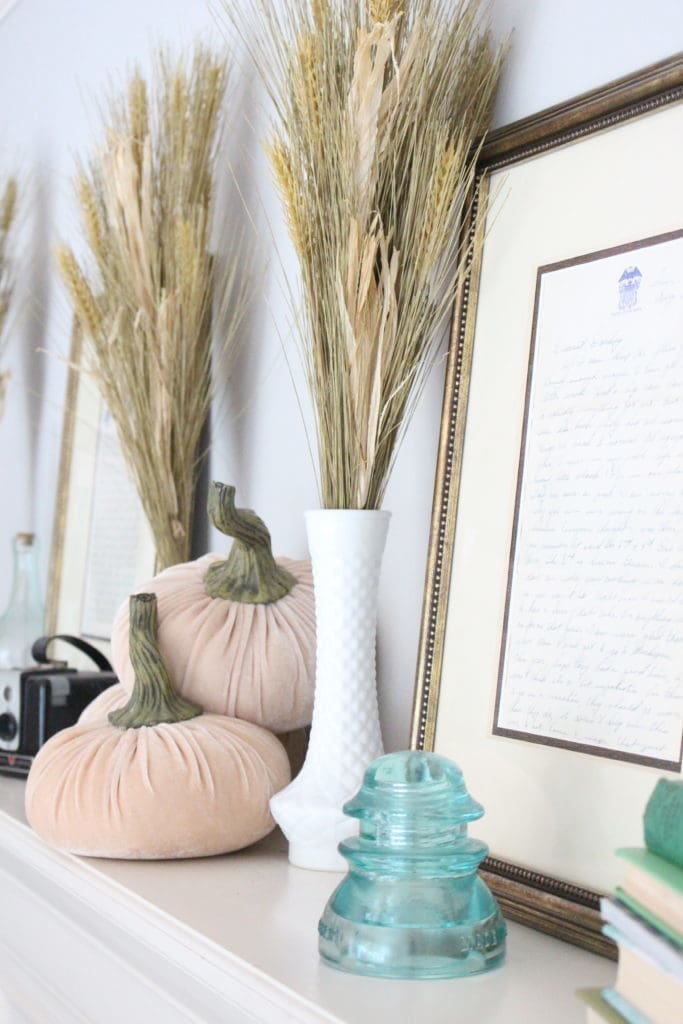 Transitional Fall Mantel- how to decorate the easy way for fall- mantel decor- mantles- decorating a fall mantel- autumn decor- decorating with wheat- pumpkins