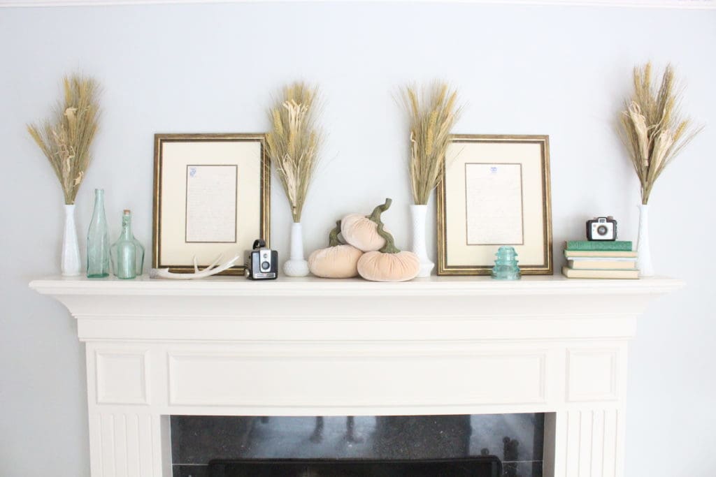 Transitional Fall Mantel- how to decorate the easy way for fall- mantel decor- mantles- decorating a fall mantel- autumn decor- decorating with wheat- pumpkins