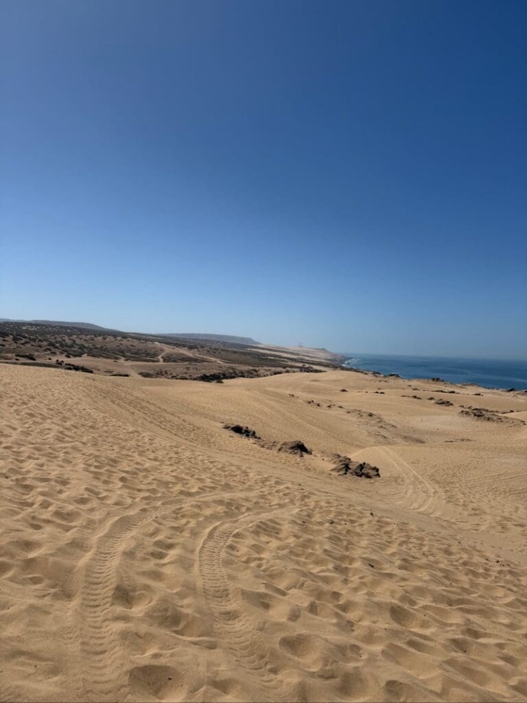 Golden sand dunes overlooking the Atlantic coast north of Agadir