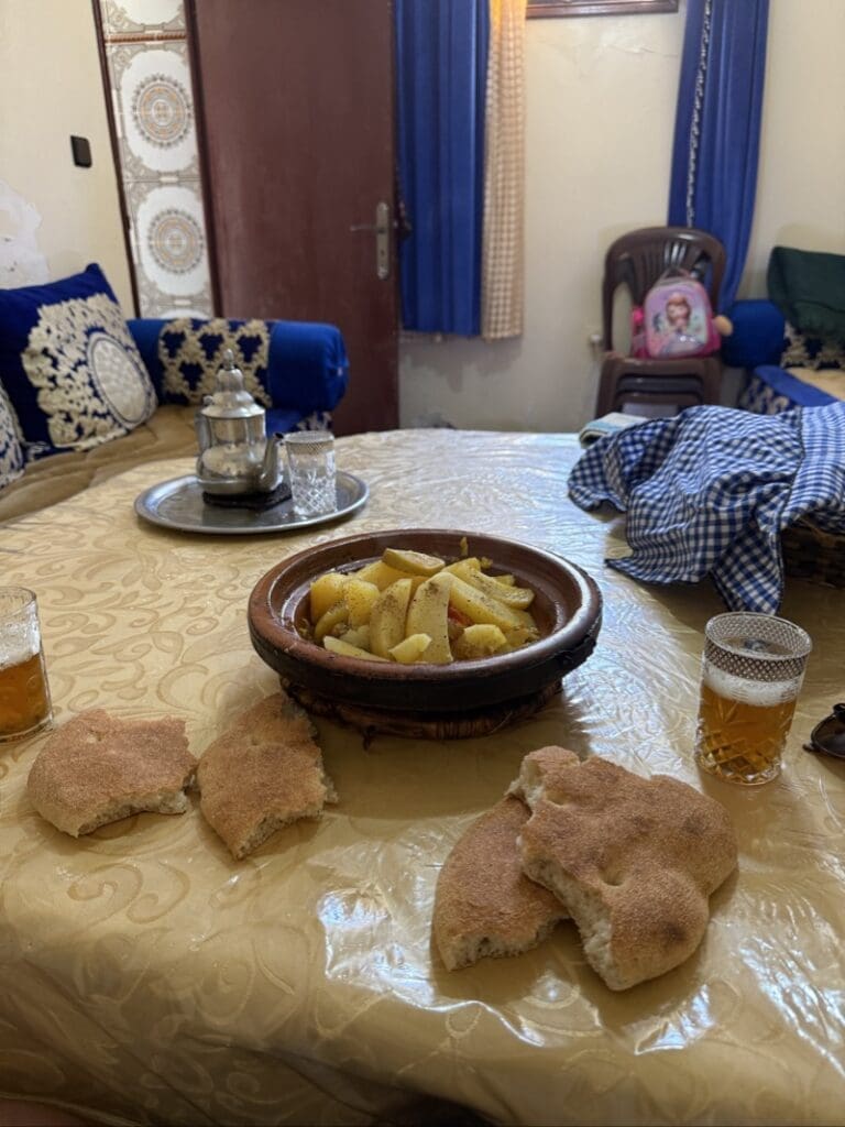 Chicken and potato tagine, torn bread and Moroccan mint tea served at the guide's family home